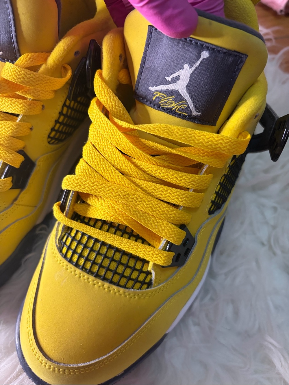 Air Jordan retro 4 yellow lighting